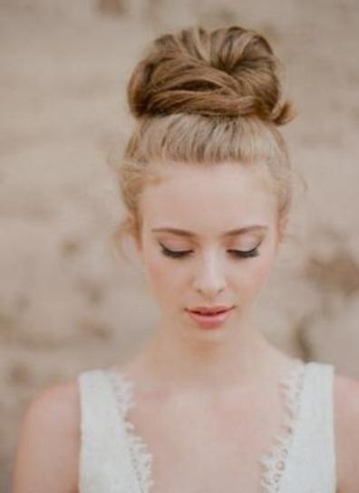 bride with a simple top bun