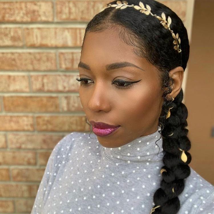 woman with braid in her hair and accessories